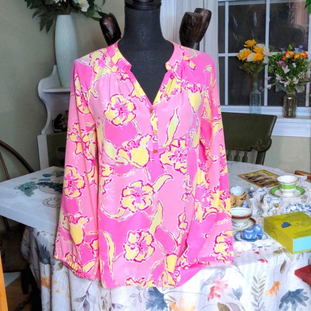 Lilly Pulitzer silk blouse, size S, has a ?stretched area flaw (see photos).
